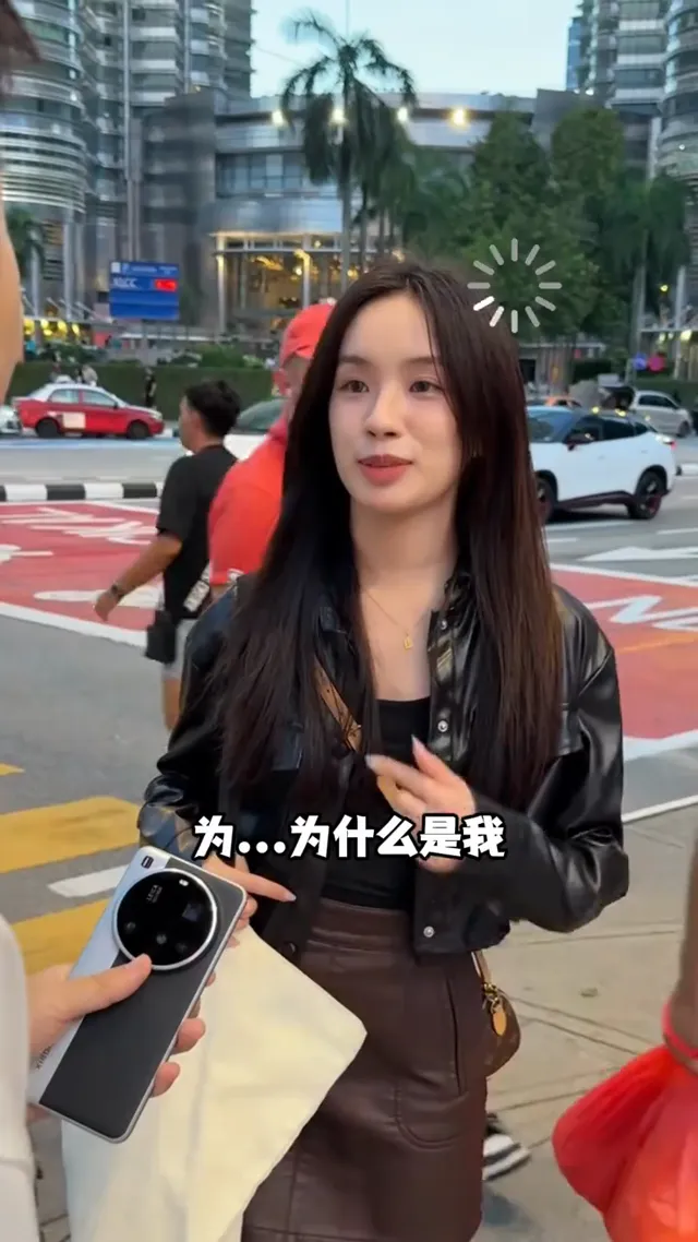 马来西亚偶遇“周也”？带本地人去双子塔打卡是什么体验？ #reels #创意摄影 #magic