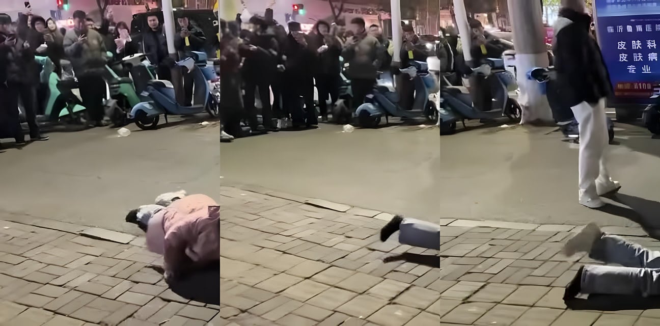 临沂步行街惊现匍匐女战士！路人围观目瞪口呆