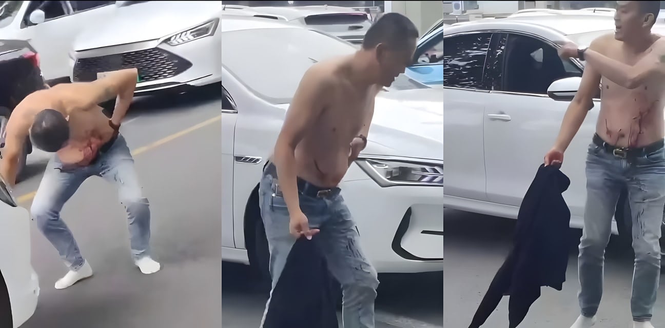 路怒炸裂！白鞋男小刀狂捅黑鞋男腹部血喷如泉 午后马路变屠宰场