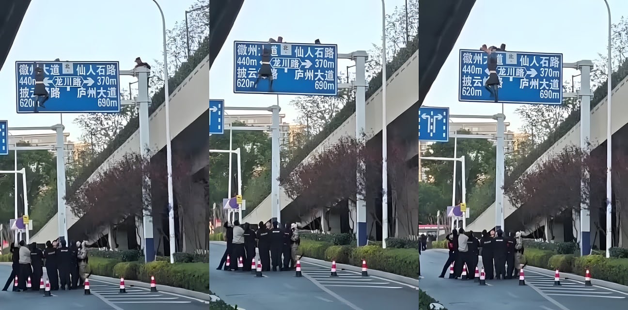小表妹爬路牌頂端幹嘛？路人目瞪口呆畫面瘋傳